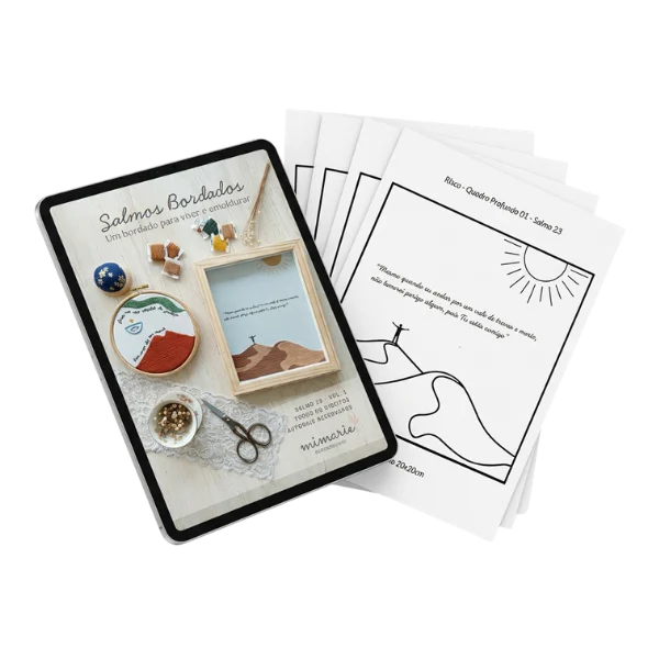Tablet mostrando o material Salmos Bordados ao lado de folhas impressas com risco do Salmo 23